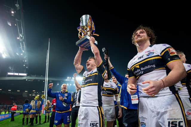 Brett Ferres celebrates with the Super League trophy after Leeds Rhinos' Grand Final win in 2017. Picture by Alex Whitehead/SWpix.com.