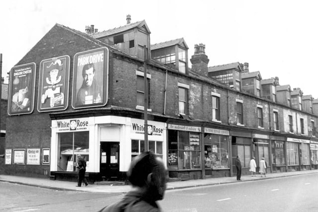 Meanwood Road in August 1967. On the left is the junction with Oatland Road. The White Rose cleaners was number 149 then moving right, numbers 151/153 were the business of Leslie Bartle, home handy man supplies. The following two shops are empty, then 159 was a bakers shop, Edwin Tipling was the owner. This is followed by a hairdressers and Firth's decorators at number 167.