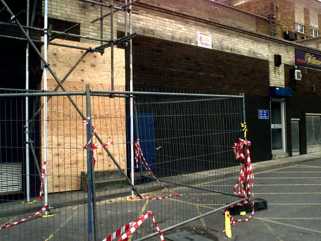 The rear of Barclays Bank in Crossgates all boarded up after a raid in March 1998.