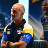 Leeds Rhinos coach Brad Arthur seen in front of a poster of star winger Maika Sivo during his week's Dream Team presentation and play-off launch at Old Trafford. Picture by Olly Hassell/SWpix.com.