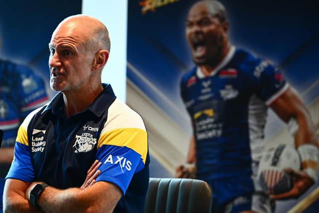 Leeds Rhinos coach Brad Arthur seen in front of a poster of star winger Maika Sivo during his week's Dream Team presentation and play-off launch at Old Trafford. Picture by Olly Hassell/SWpix.com.