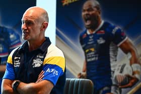 Leeds Rhinos coach Brad Arthur seen in front of a poster of star winger Maika Sivo during his week's Dream Team presentation and play-off launch at Old Trafford. Picture by Olly Hassell/SWpix.com.