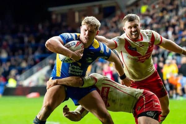Leeds Rhinos' James McDonnell is tackled by Joe Batchelor during this month's Super League loss to St Helens. Picture by Allan McKenzie/SWpix.com.