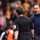 Wolverhampton Wanderers manager Julen Lopetegui (right) reacts to assistant referee Gary Beswick during the Premier League match at Molineux Stadium, Wolverhampton. Picture date: Saturday March 18, 2023. (Credit: PA)
