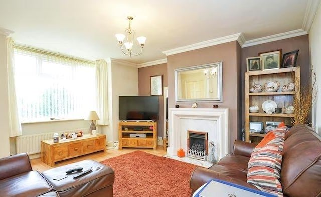 The property is arranged over two floors only and briefly comprises of an inviting entrance hall, cosy lounge with feature fireplace, exquisite kitchen/diner with matching wall and base units.
