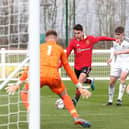 FALSE HOPE: Gabriele Biancheri, left, puts Manchester United's under-18s 3-1 up against Leeds United's under-18s at Thorp Arch only for the Whites to storm back and seal a 3-3 draw. Photo by John Peters/Manchester United via Getty Images.