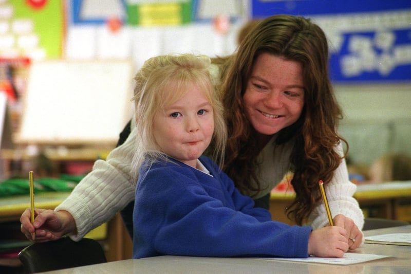 Teacher Clara Wheatley with pupil Josie Bottomley Kirkstall Road Primary in November 1999.  The school was celebrating after receiving full marks in an Ofsted report.