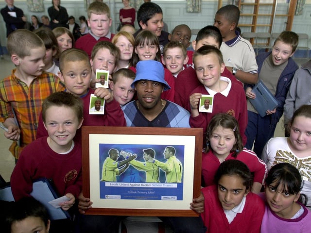 Leeds United player Michael Duberry presents pupils at Hillside Primary School, Beeston with their Leeds United Against Racism award.
