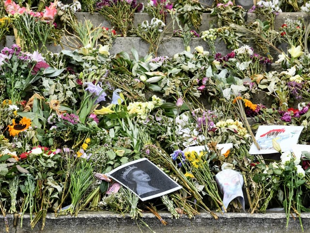Floral tributes have been left for the Queen in Millennium Square since her death