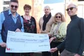 Staff and Volunteers of The Old Girls' School in Sherburn in Elmet receiving the cheque from Toyota