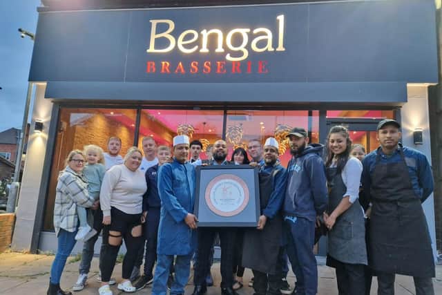 The Bengal Brasserie team with some of their many regular customers. Photo: National World