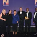 Receiving the Northern Housing Team of the Year Award 2024 from Steve Gayter (centre), Executive Dir