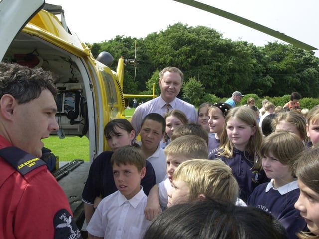 MP Paul Truswell listens as paramedic Steve Wilson chats to pupils when the Yorkshire Air Air Ambulance visited Calverley C of E Primary in June 2001.