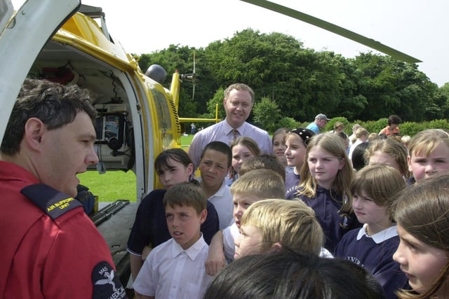 MP Paul Truswell listens as paramedic Steve Wilson chats to pupils when the Yorkshire Air Air Ambulance visited Calverley C of E Primary in June 2001.