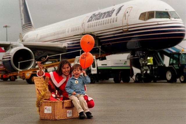 Young Daniel Davison was the one millionth passenger to fly out of Leeds and Bradford Airport in 1996. He is pictured in December 1996 with Bev Amos, airport marketing co-ordinator. Daniel and his parents were on their way to Benidorm for a weeks holiday aboard  a Britannia flight to Alicante.