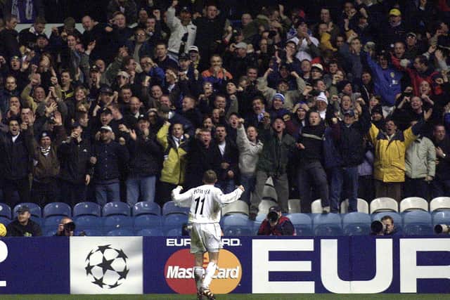'SPECIAL': Lee Bowyer celebrates with Leeds United's fans at Elland Road after his wining goal against Anderlecht in the Champions League clash of February 2001.
Photo by GERRY PENNY/AFP via Getty Images.