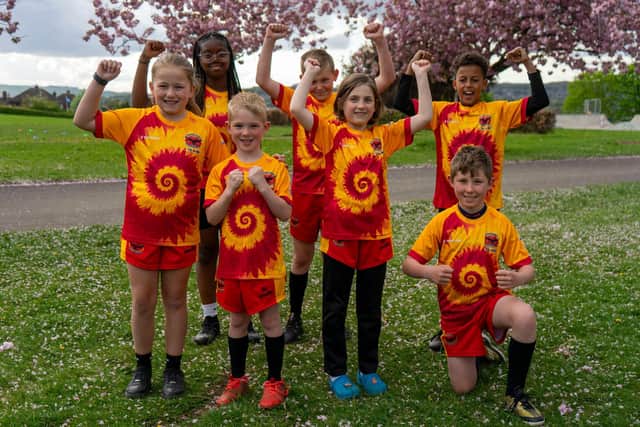 Players from Sheffield Hawks wearing their Ely-inspired post-match shirts.