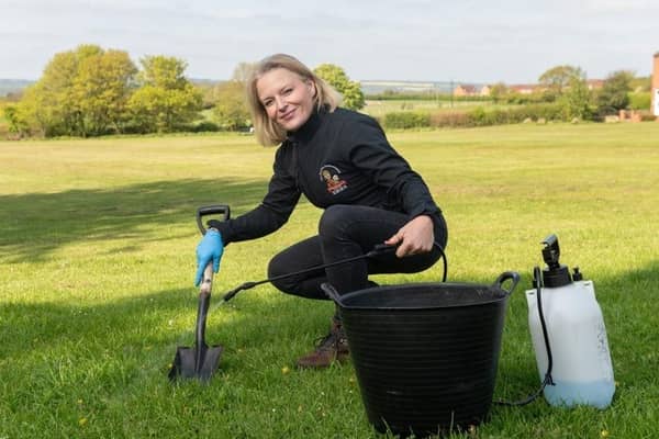 Emma Garner, 45, has told how she was able to buy her £195,000 four-bed detached house with the money she has earned scooping dog mess.