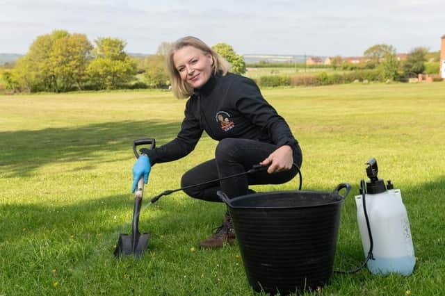 Emma Garner, 45, has told how she was able to buy her £195,000 four-bed detached house with the money she has earned scooping dog mess.