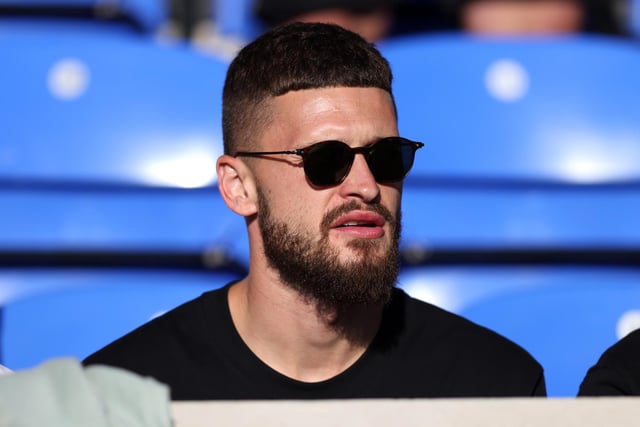 Mateusz Klich watches on through his sunglasses after returning to training on Monday (Photo by George Wood/Getty Images)