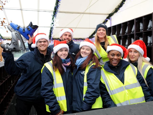 Smiling staff get ready to meet the skaters.