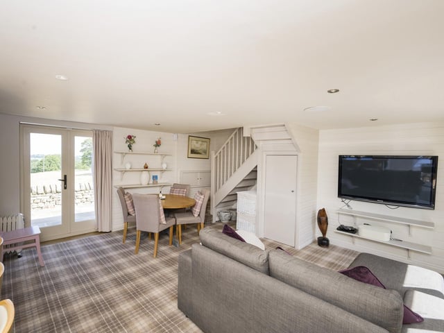 The property includes a one bedroom cottage within its sale.