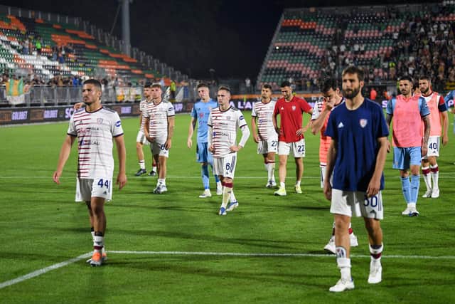 VENICE, ITALY - MAY 22: Players of Cagliari show their dejection after the Serie A match between Venezia FC and Cagliari Calcio at Stadio Pier Luigi Penzo on May 22, 2022 in Venice, Italy. (Photo by Getty Images/Getty Images)