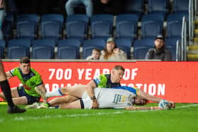 Leeds Rhinos' Paul Momirovski had this touchdown ruled out for a double-movement during the 34-8 home loss to Warrington Wolves. Picture by Bruce Rollinson.