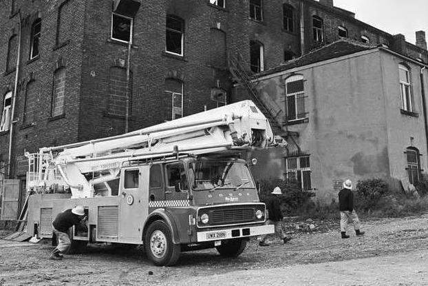 Fire fighters at the Queen's Mill fire of 1985.