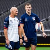 Leeds Rhinos captain Ash Handley, right, with coach Brad Arthur at Allegiant Stadium in Las Vegas. Picture by Alex Whitehead/SWpix.com.
