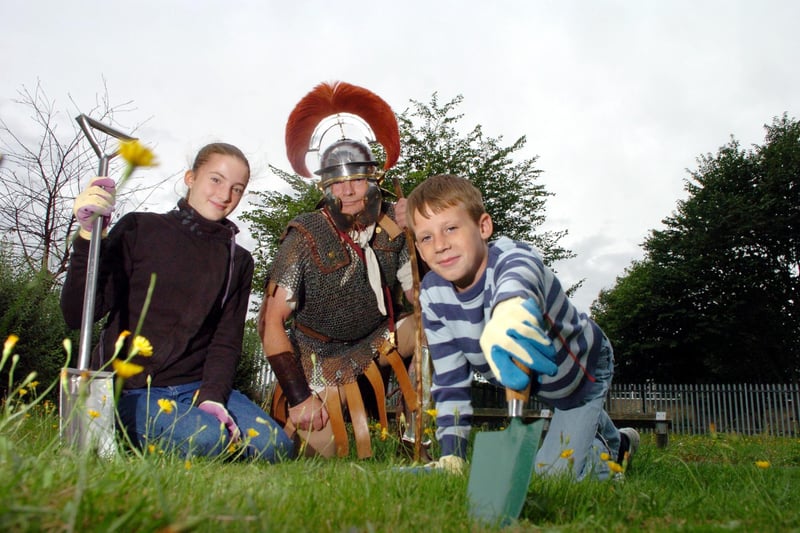 Pupils met a Roman centurion to start an archaeological dig at the school in August 2006. Pictured is Jeff Barnett as Jefficus the centurion with pupils Lucy Smith and Ben Medley.