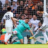 MILESTONE: For Leeds United defender Luke Ayling, right, pictured opening the scoring in last weekend's 2-2 draw at home to Newcastle United in his 250th appearance for the Whites. Photo by LINDSEY PARNABY/AFP via Getty Images.