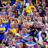 Leeds Rhinos fans celebrate their side's win at Castleford Tigers 11 months ago. Picture by Olly Hassell/SWpix.com.