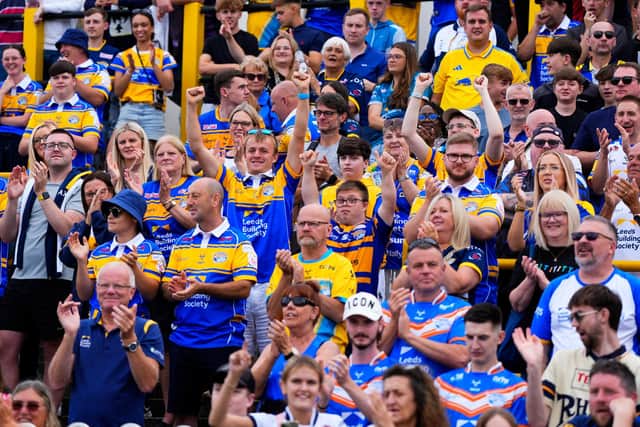 Leeds Rhinos fans celebrate their side's win at Castleford Tigers 11 months ago. Picture by Olly Hassell/SWpix.com.