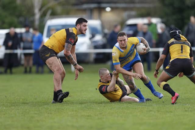 Hunslet ARLFC's Micky Hoyle, with ball. Picture by Alex Shenton