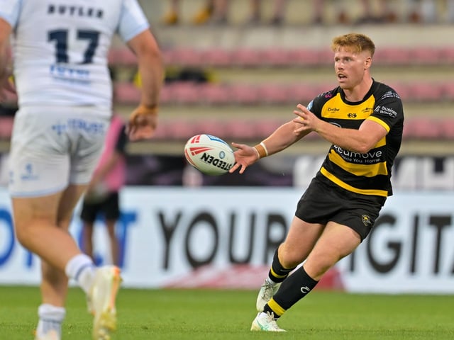 Grade A late contact on passer, one penalty point, total points one - no further action.