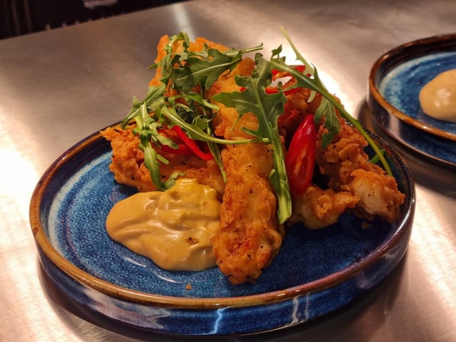 The menu at the Wonky Donkey includes dishes like chicken in a homemade coating.