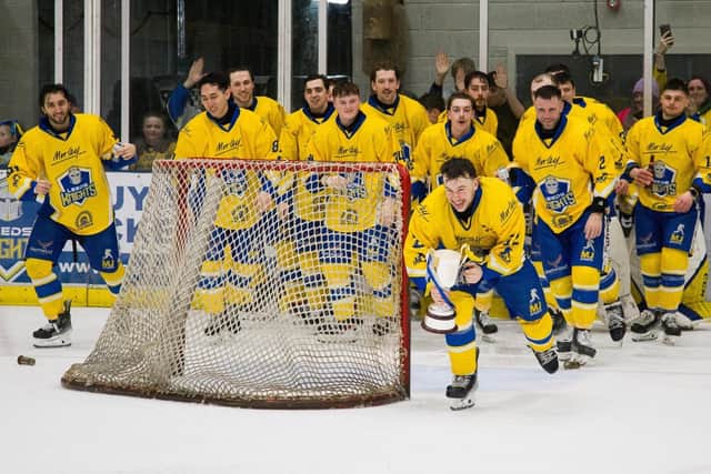 MAGIC NIGHT: Kieran Brown celebrates with the trophy after Leeds Knights win the NIHL National league title for the second year running. Picture courtesy of Jacob Lowe/Knights Media