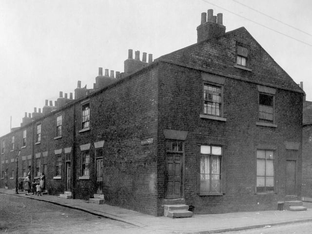 Looking down Humane Street from Low Road, row of two storey terrace houses. Next junction to right is with Society Street.