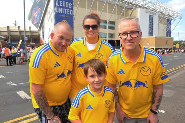 INSTANT HIT: Leeds United's new away kit has gone down well with supporters, as shown by Craig Powell, Simona Syaroua, Joshua Vidler and Mark Powell at Elland Road for the friendly against Valencia