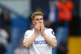 LEEDS, ENGLAND - MAY 23: Gaetano Berardi of Leeds United reacts during his final game as he leaves the pitch during the Premier League match between Leeds United and West Bromwich Albion at Elland Road on May 23, 2021 in Leeds, England. A limited number of fans will be allowed into Premier League stadiums as Coronavirus restrictions begin to ease in the UK. (Photo by Lynne Cameron - Pool/Getty Images)