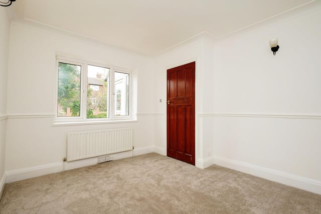 Upstairs, there are three good size bedrooms.  All the bedrooms are carpeted and decorated in a neutral scheme for ease of redecoration.