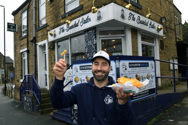 Owner Alex Papaioannou outside his fish and chip shop, The Bearded Sailor. He left his 10-year long career in teaching to pursue the business. Photo: Jonathan Gawthorpe