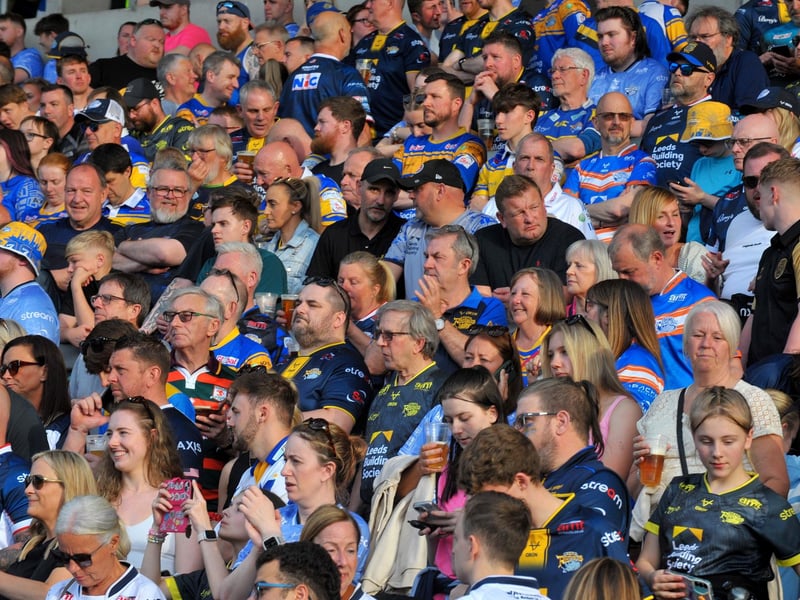 A crowd of 14,132 watched Leeds Rhinos run in nine tries to crush Huddersfield Giants 52-0 at AMT Headingley.