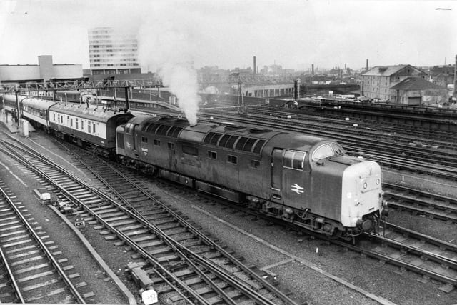 Deltic Diesel 55002 King's Own Yorkshire Light Infantry, the last Yorkshire Pullman service from Leeds to London, pulls slowly out of platform five at Leeds City Station.