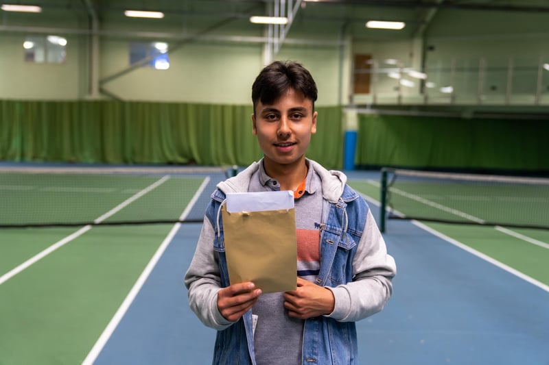 Ahmed Recieving his GCSEs. Picture By: Andy Hornby