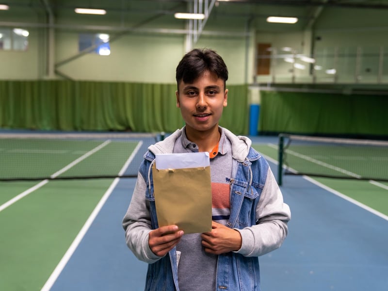 Ahmed Recieving his GCSEs. Picture By: Andy Hornby