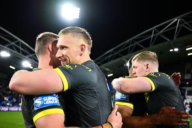 Leeds Rhinos' Mikolaj Oledzki celebrates last week's win at Huddersfield Giants. Picture by Olly Hassell/SWpix.com.