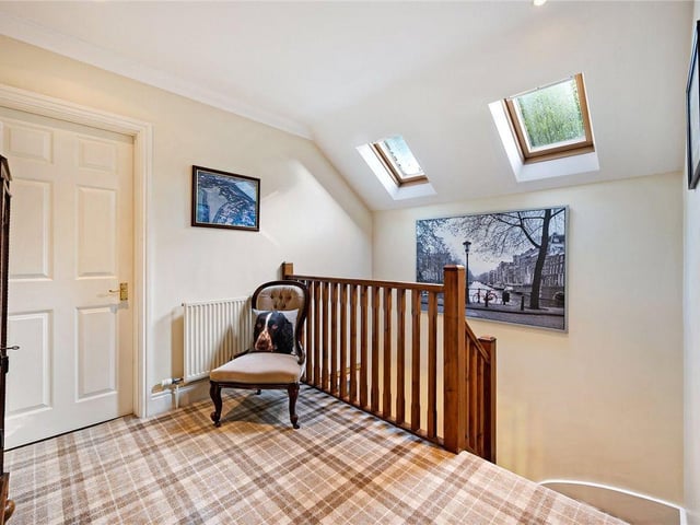 To the first floor is a central landing with Velux rooflights flooding the space with natural daylight.