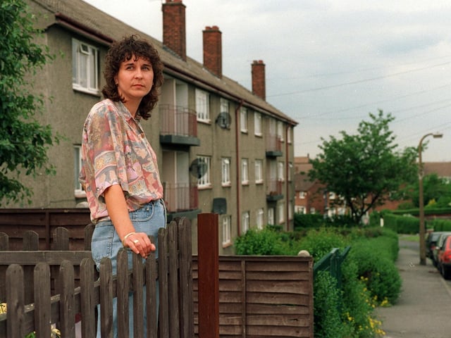 This Julie Bulloch outside her Belle Isle home in September 1997. She claimed her dog, Peggy, had been kidnapped for dog fighting purposes.